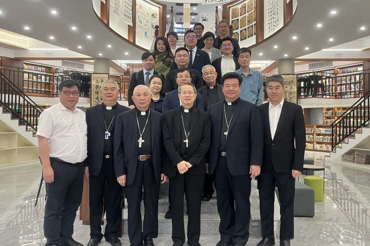 The delegation from the Diocese of Macau took a group  picture with pastors in Guangdong during a visit to Guangdong Union Theological Seminary in Guangzhou City on April 25, 2023.