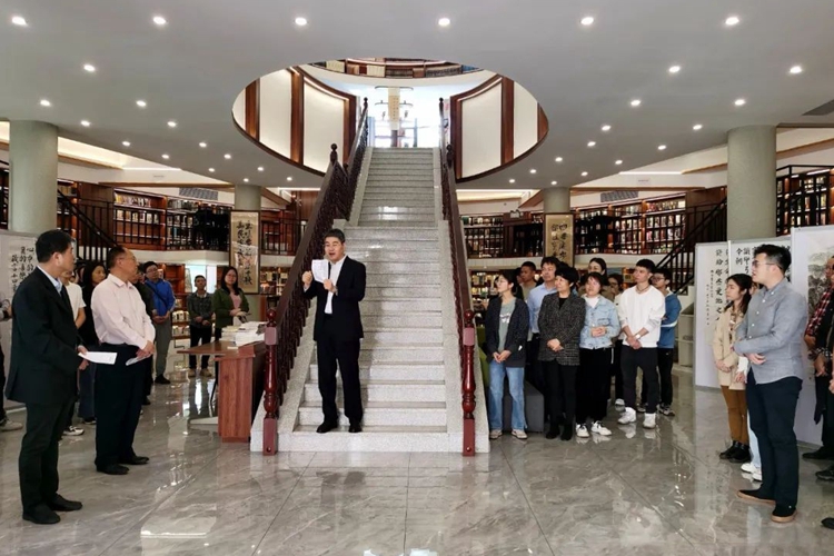 Rev. Guo Yun, president of the Guangdong Christian Council, gave speech urging students improve their artistic skills during an opening ceremony of an exhibition of photography, calligraphy, and painting at Guangdong Union Theological Seminary's library on April 26, 2023.
