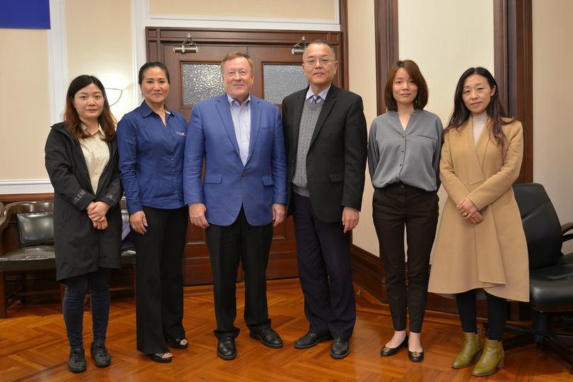 Delegation from Word4Asia Consulting International (Dr. Gene Wood standing on the third from the left) visited CCC&TSPM and talked about churches and cooperation on April 4, 2023.