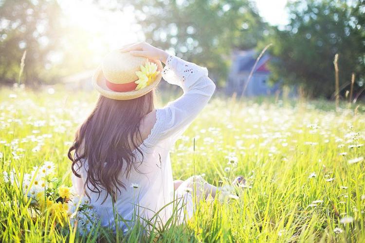 A picture of a girl in the Grass