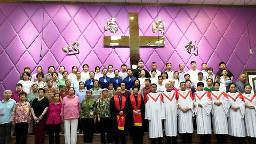 Group photo of 59 newly baptized members with church staff (Elder Zhou and Rev. Zhang Xiuxi in the middle) in Shenzhou Church in Zhangdian District, Zibo City, Shandong Province on July 16, 2023.