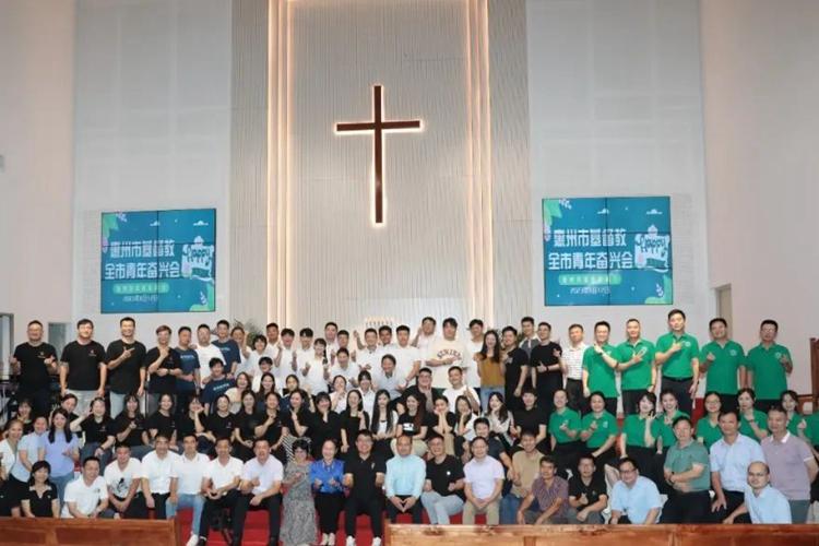 Believers and pastoral staff took a group picture after attending the first youth revival meeting held in Huizhou, Guangdong, on August 12, 2023. 