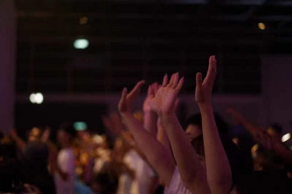 People worshiped God during a worship revival summit themed "Revival" held by Stream of Praise (SOP) Music Ministries at the Hong Kong Convention and Exhibition Center on August 6th, 2023. 