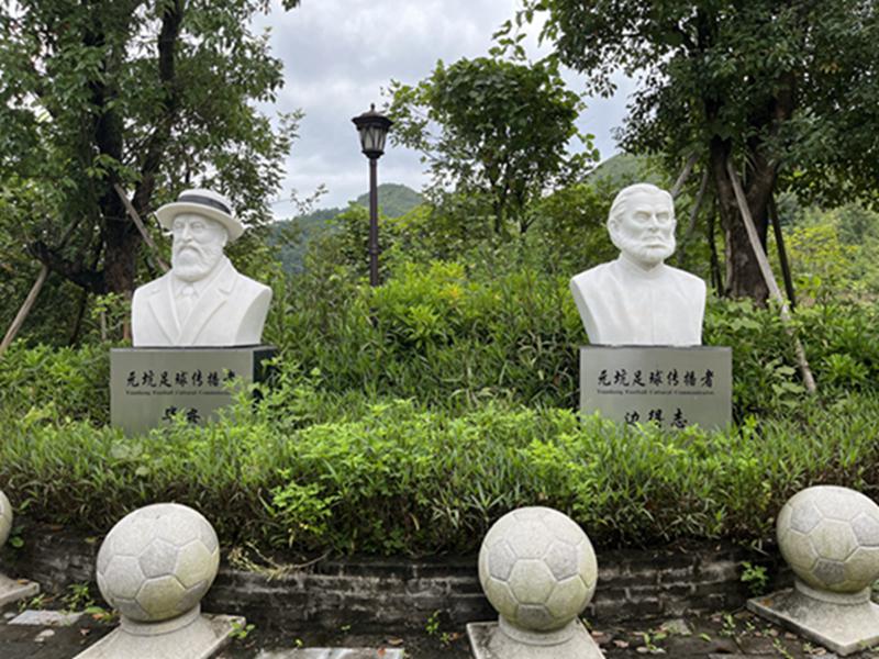 The sculptures of two Basel Mission missionaries named Charles Piton and Heinrich Bender inside Yuankeng Historic Site in Wuhua, Meizhou, Guangdong