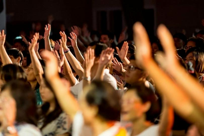 Young people attend a church service in China. 