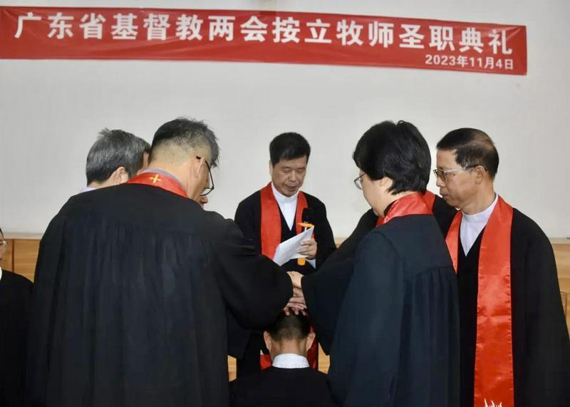 The pastorate put their hands on a male staff member during an ordination service held in Dongshan Church in Jieyang City, Guangdong Province, on November 4, 2023. 