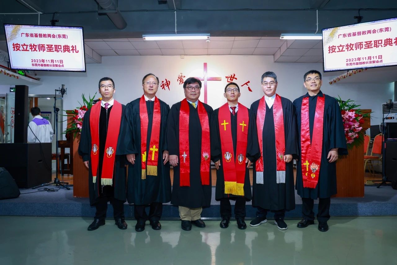 A group photo was taken at the ordination for a new pastor, Tu Zhifu (3rd from right), held in Dongguan City, Guangdong Province, on November 11, 2023.