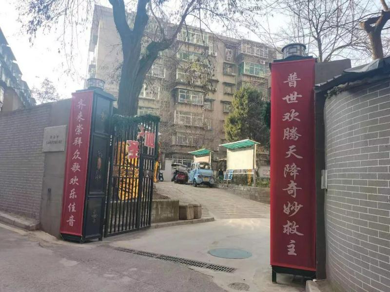 A special couplet is posted on the entrance to celebrate Christmas at the Dongxin Xiang Church in Xi'an City, Shaanxi Province, during the 2023 Christmas season.