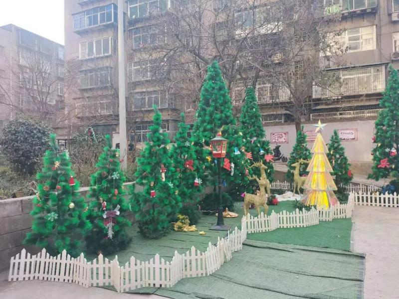 Christmas trees are placed in the yard to celebrate Christmas at the Dongxin Xiang Church in Xi'an City, Shaanxi Province, during the 2023 Christmas season.