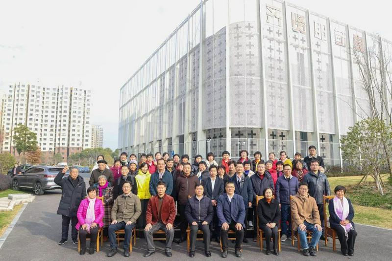 A group photo was taken in front of the newly relocated Qixian Jesus Church in Fengxian District, Shanghai City, on December 27, 2023.