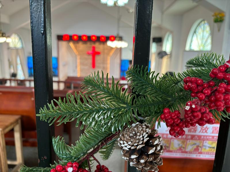 A close-up of the Christmas tree branch against the Gongchen chapel's interior in Hangzhou City, Zhejiang Province