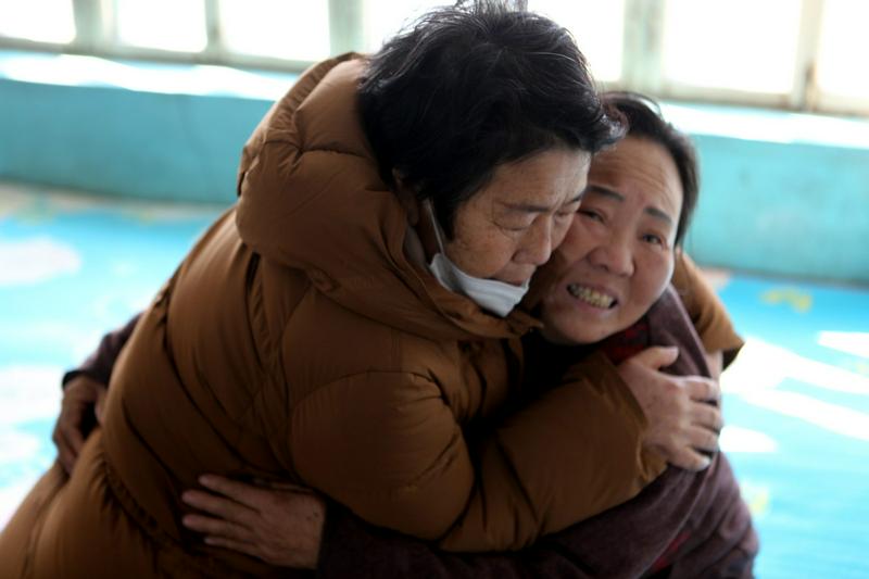 A picture of the church staff and the visited hugging together in tears during the Eternal Life Church's visitation event “Greet the Spring Festival with Love and Targeted Assistance” before the Chinese Spring Festival in Gaizhou City, Liaoning Province, in late January 2024