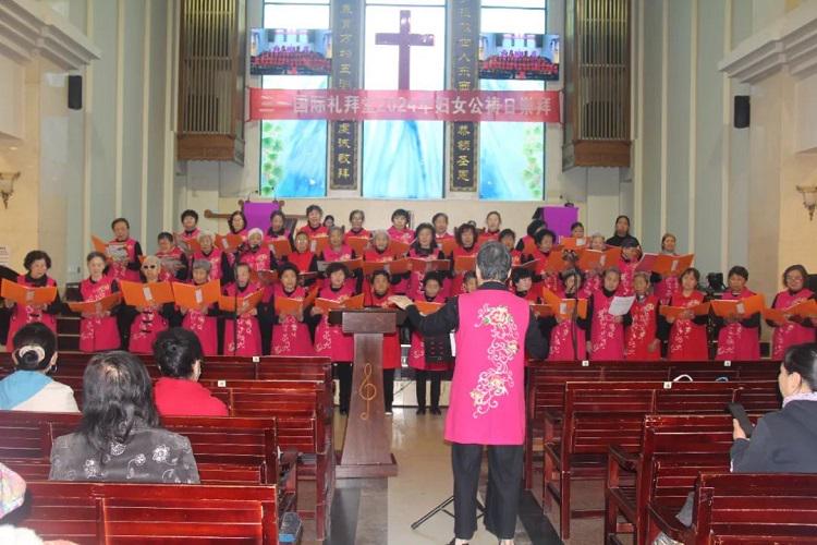 Middle-aged Christian women sang a hymn during a World Day of Prayer service at Yunnan Trinity International Church on March 8, 2024.