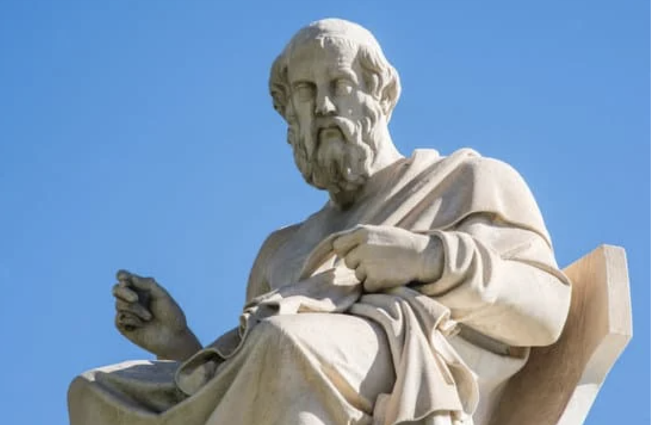 A picture of a stone statue of Plato