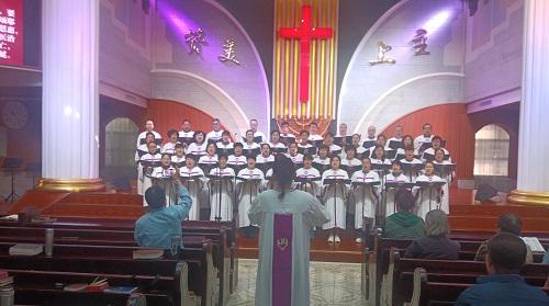 Choir members sang a hymn during a Mother's Day worship service at Shuguang Church in Baoji, Shaanxi, on May 12, 2024.