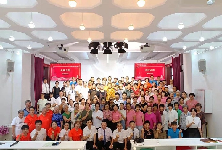 A group picture was taken during a celebration activity held for the first anniversary of the reopening of Wanshan Church in Guangzhou, Guangdong, on June 2, 2024.