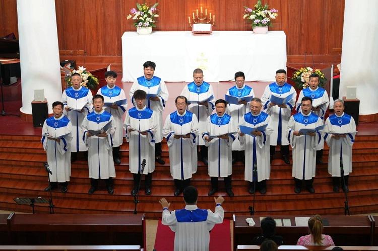 Male choir members sang a hymn during the Father's Day service at Guangxiao Church in Guangzhou, Guangdong, on June 16, 2024.