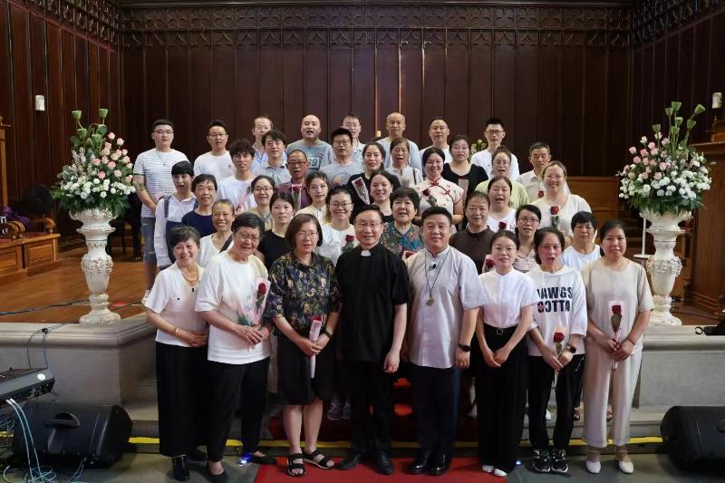 Newly baptized members and pastors took a group picture after a baptism and communion service at Dushu Lake Church in Suzhou, Jiangsu, on July 7, 2024.