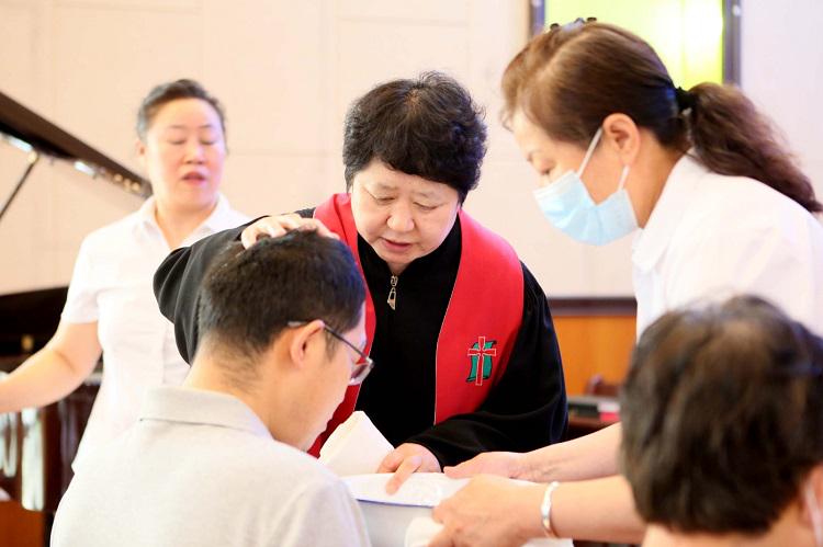 A baptism was performed by sprinkling a seeker at West Wuma Road Church in Changchun, Jilin, on July 14, 2024.