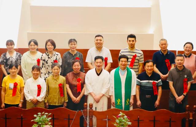 The pastorate and new believers took a group picture after the baptism service at Banshan Church in Hangzhou, Zhejiang, on July 7, 2024.
