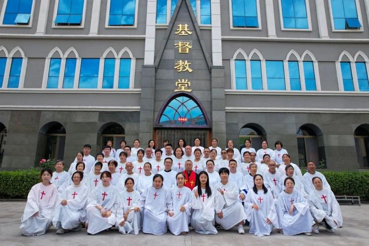 A total of 54 newly-baptized members took a group picture at Chengqu Church in Jincheng City, Shanxi Province, on July 28, 2024.