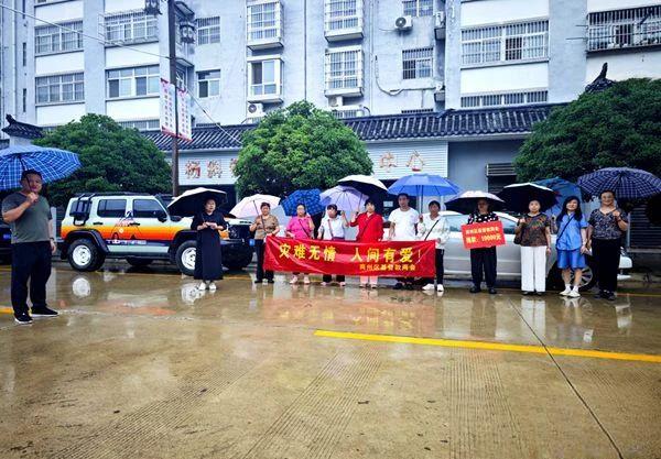 A group picture was taken when a donation was made by christians to flooded areas in Yangxie Town, Shangzhou District, Shangluo City, Shaanxi Province,  on July 29, 2024.