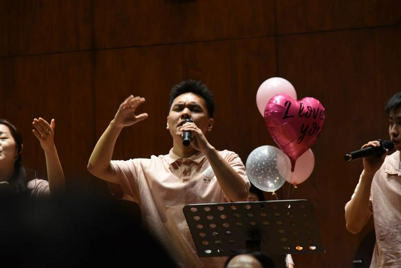 A young man performed at a themed praise meeting, "It’s All for Love," at Shangdu Church in Fuzhou City, Fujian Province, on Chinese Valentine's Day, August 10, 2024.
