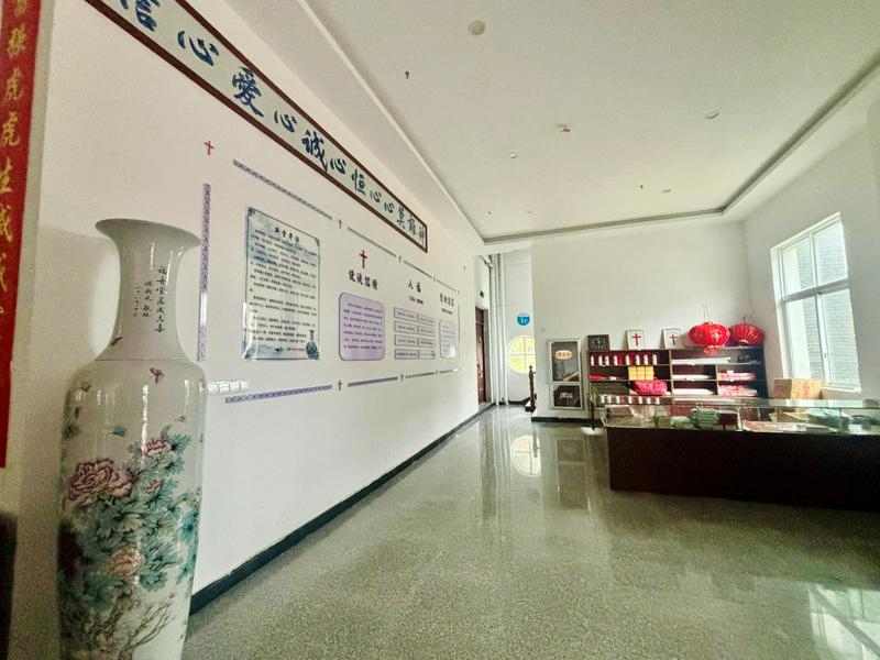 One of the ceramic couplets (right) shown at the Jingdezhen Church in Jingdezhen City, Jiangxi Province.