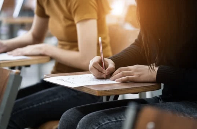 A picture of people taking an examination.