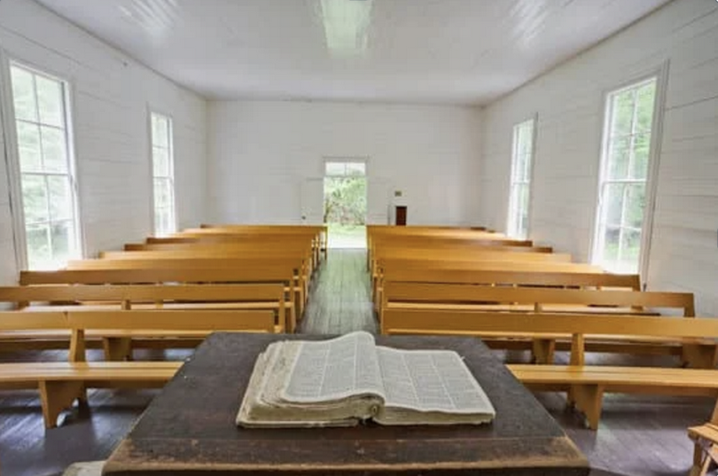 An open Bible on the pulpit in a church