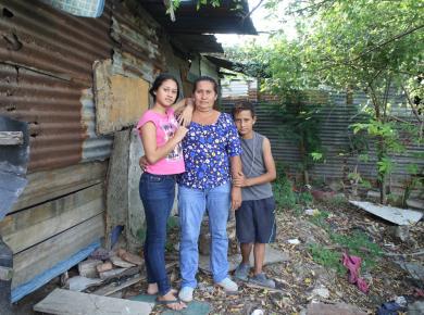 María Socorro Pineda (middle) and her children Evelin Briggith Lopez Pineda (17) and Herson Alfredo Pineda (13) left with a migrant caravan in October but were forced by illness to come back home to Honduras.