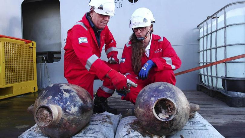 Two completely intact pottery vessels used for storage have been discovered from the world's most ancient ship ever found in the deep seas.