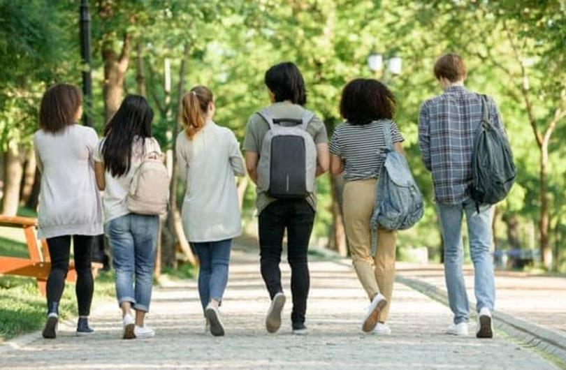 Back view image of a group of young people