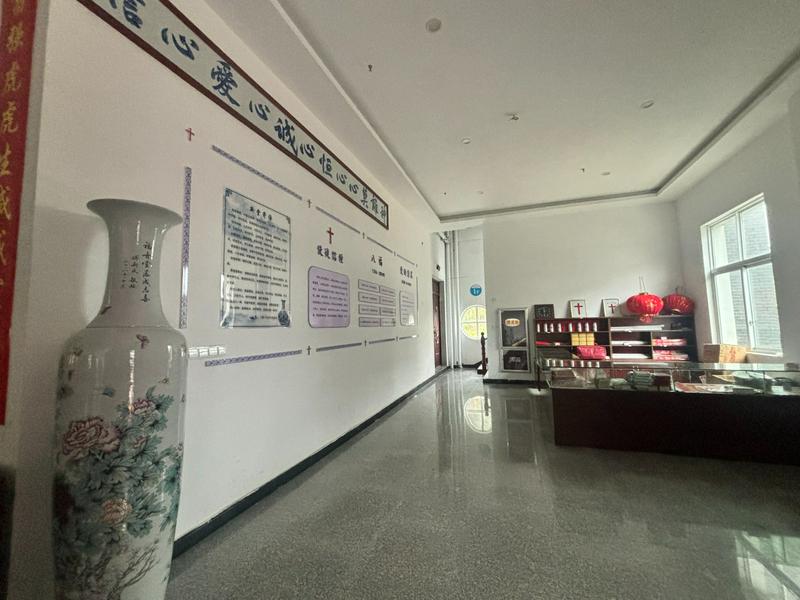 One of the ceramic couplets (right) shown at the Jingdezhen Church in Jingdezhen City, Jiangxi Province