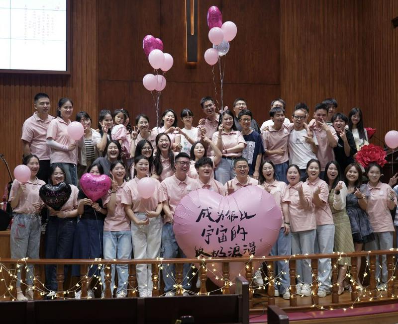 A group photo of a youth praise team after their performance at a praise meeting at Shangdu Church in Fuzhou City, Fujian Province, on Chinese Valentine's Day, August 10, 2024