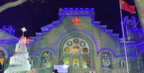 Chongwenmen Church in Beijing with a lighting Christmas tree at night