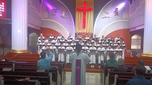 Choir members sang a hymn during a Mother's Day worship service at Shuguang Church in Baoji, Shaanxi, on May 12, 2024.