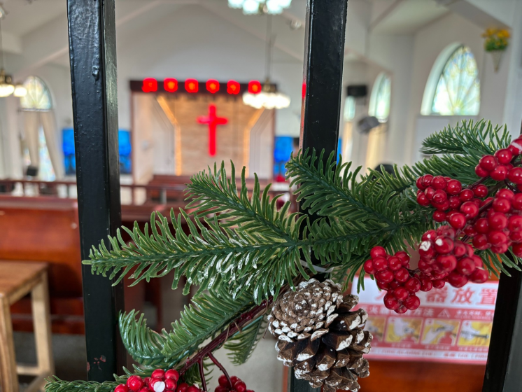 A close-up of the Christmas tree branch against the Gongchen chapel's interior in Hangzhou City, Zhejiang Province