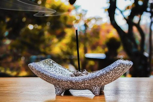 An incense stick inside a temple