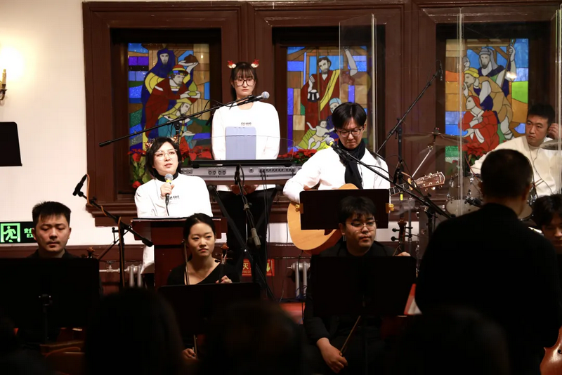 Christians performed with different instruments in celebration of Christmas at a church in Beijing during Christmas Week 2024.
