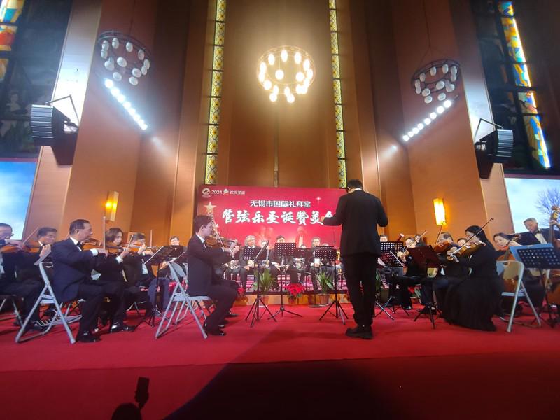 Believers dressed in suits staged an orchestral performance in celebration of Christmas at Wuxi International Church in Wuxi City, Jiangsu Province, on December 22, 2024.