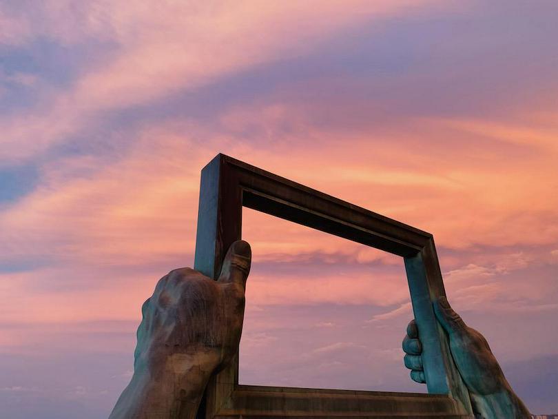 The iconic "Large Photo Frame" in Weihai City, Shandong Province, at sunset