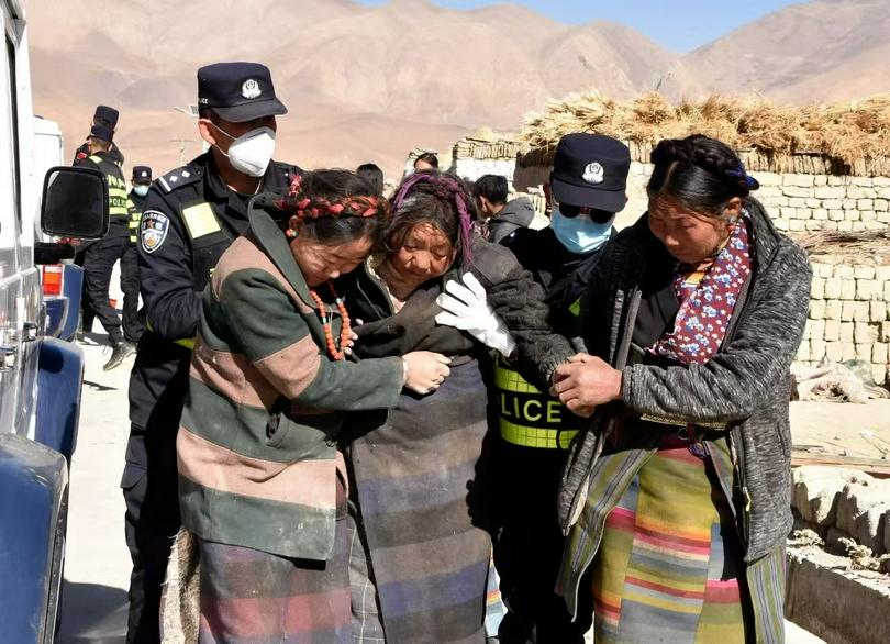 Rescuers transferred the injured at Zhacun Village of Dingri County in Xigaze, southwest China's Tibet Autonomous Region, Tuesday, Jan. 7, 2025.