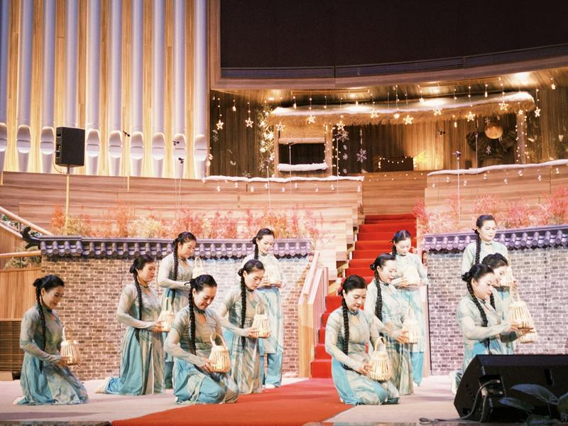 A group of Christian women dressed in festive costumes performed a dance with bamboo baskets to mark Christmas at Liushi Church in Wenzhou City, Zhejiang Province, on December 24, 2024.