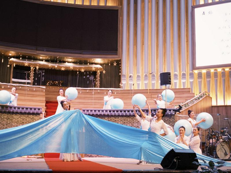 Christian women performed a dance with exercise balls in celebration of Christmas at Liushi Church in Wenzhou City, Zhejiang Province, on December 22, 2024.