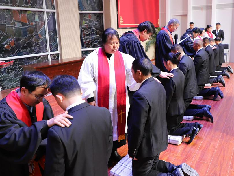 The pastorate performed a laying-on-of-hands ceremony during the graduation ceremony for the 2024 one-year volunteer class at the Zhongnan Theological Seminary in Wuhan City, Hubei Province, on January 2, 2025.