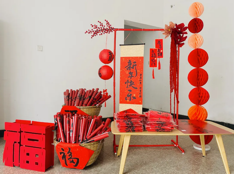 A photo showcasing the onsite setting of the Spring Festival couplets gifting event at Jesus Church in Jinze Township, Qingpu District, Shanghai, before Chinese New Year 