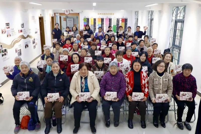 Christian women received gifts during the World Day of Prayer and International Women's Day event hosted by Ci'en Church in Huadu District, Guangzhou, Guangdong Province, on March 7, 2025.