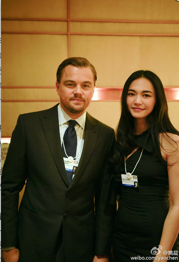 Yao Chen and  Leonardo DiCaprio