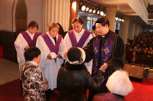 Zhumiandian churches hold baptism service
